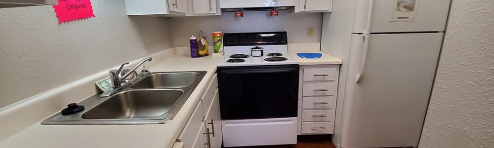 In-unit green-certified washer and dryer in a model apartment at Briar Glen in Oklahoma City, Oklahoma