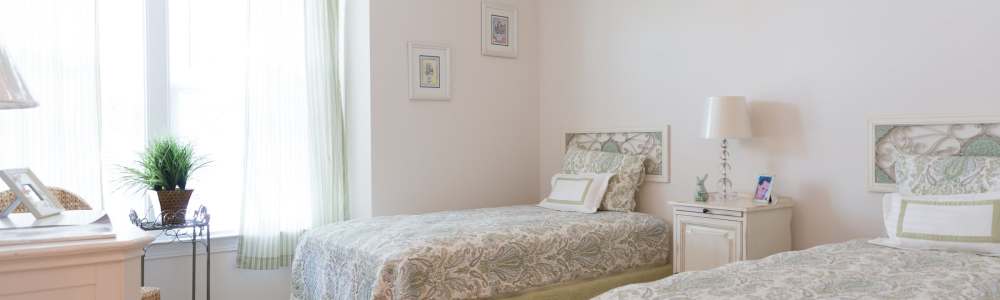 A bedroom with two twin beds at Cloisters at Carolina Forest in Myrtle Beach, South Carolina