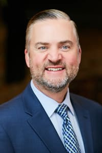 James T. Guffee, President and CEO