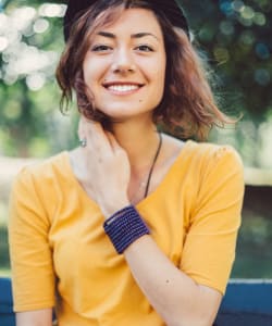 A woman smiling near BestBox Storage - Red Lodge in Red Lodge, Montana