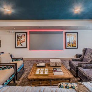 Activity room with games and a chalkboard at Atlas Point at Prestonwood in Carrollton, Texas