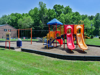 Sundeck and swimming pool area at Nieuw Amsterdam Apartment Homes in Marlton, NJ