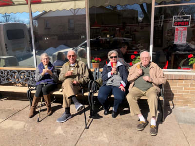 Happy seniors eating ice cream at Eastern Star Masonic Retirement Campus in Denver, CO