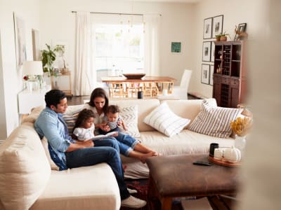 Residents in their living room at Amador Apartments in Hayward, California