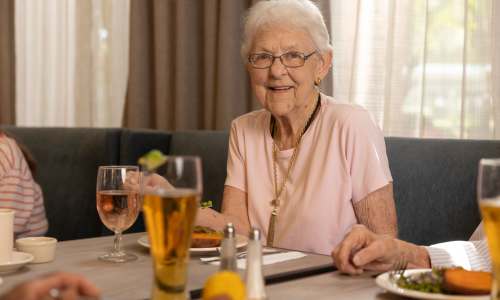Caregiver and residents at The Blake at Lafayette in Lafayette, Louisiana