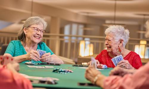 Residents playing poker at The Barclay at Santa Rosa Beach in Santa Rosa Beach, Florida