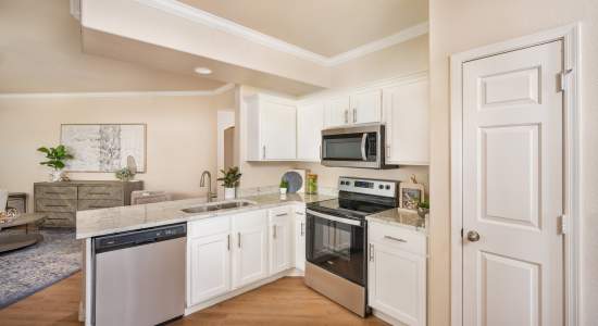 Kitchen and living room  at Villas on Hampton Avenue Apartments in , AZ