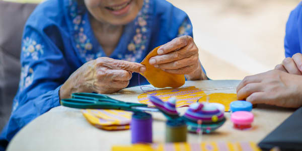 resident making art at Maple Ridge Care Center in Spooner, Wisconsin