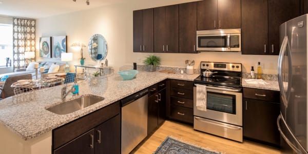 Spacious kitchen with bright windows and tall ceilings at The Residences at Annapolis Junction in Annapolis Junction, Maryland