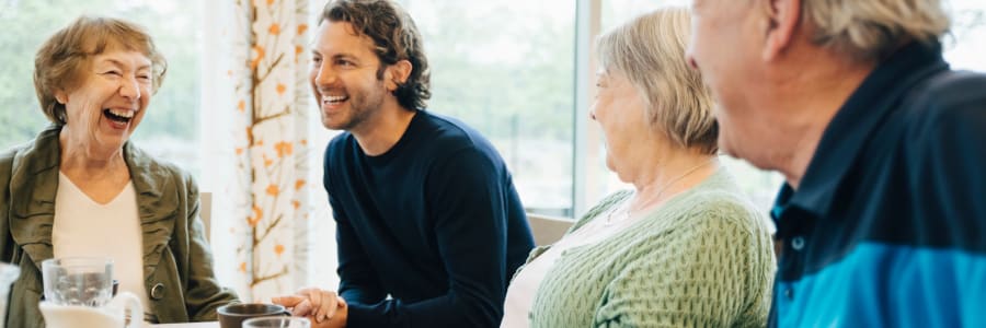 Group talking session led by a caretaker at Fair Oaks Health Care Center in Crystal Lake, Illinois