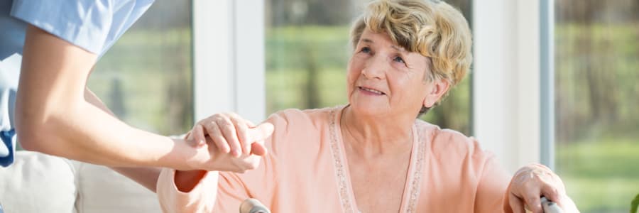 Resident engaging in conversation with their doctor at Montello Care Center in Montello, Wisconsin