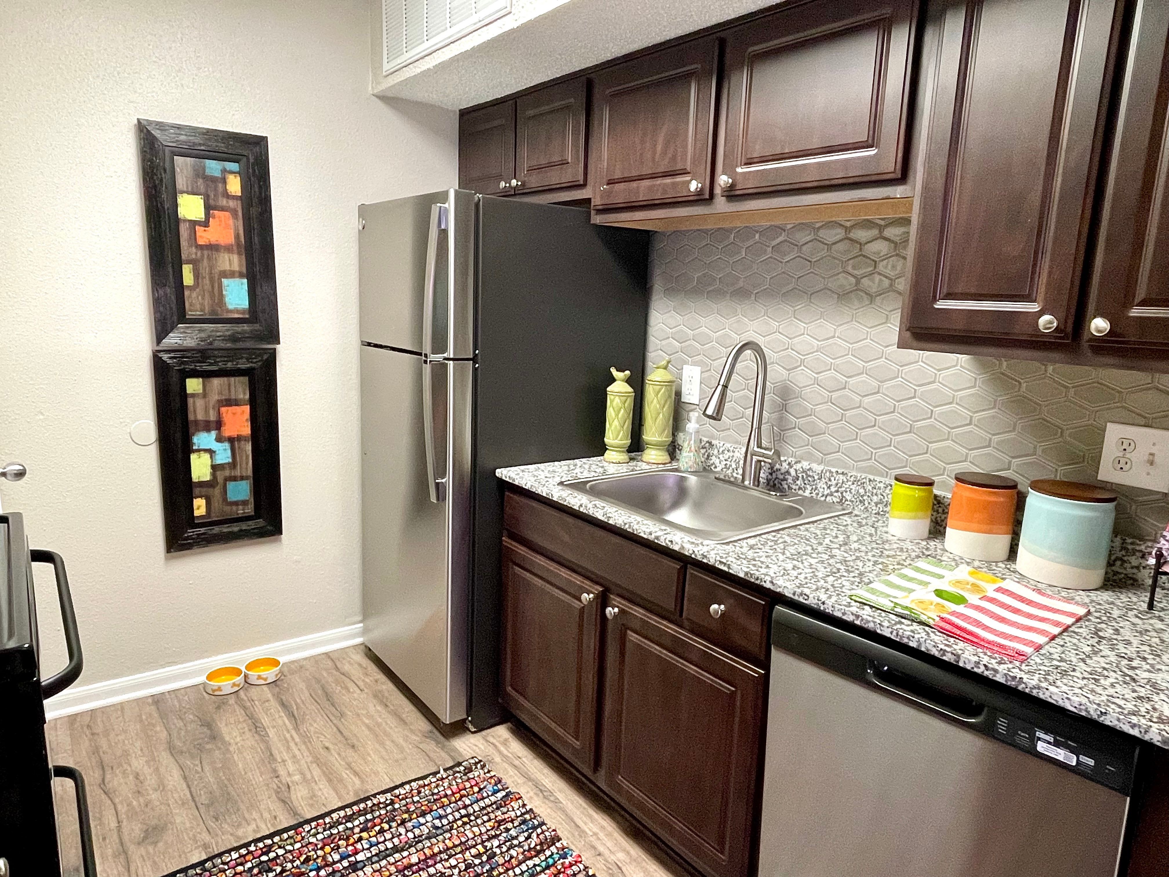 Fully equipped kitchen at The Abbey at Montgomery Park in Conroe