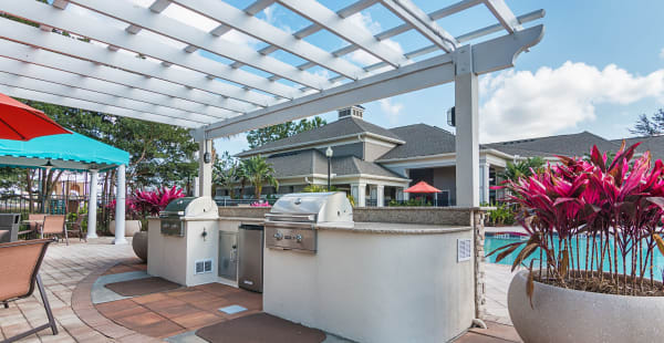Outdoor BBQ grill area at Landings at Four Corners in Davenport, Florida