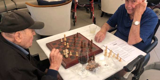 Residents playing chess at The Barclay at Charlottesville in Charlottesville, Virginia