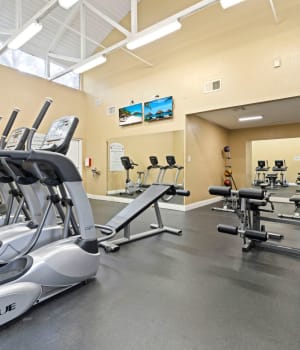 Exercise equipment in the fitness center at Azalea Village in West Palm Beach, Florida