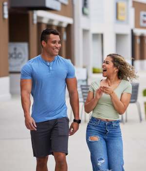 Couple walking downtown Woodside at Seven Pines in Jacksonville, Florida