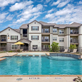 The sparkling community swimming pool at Cypress Creek at River Oaks Boulevard in Waxahachie, Texas
