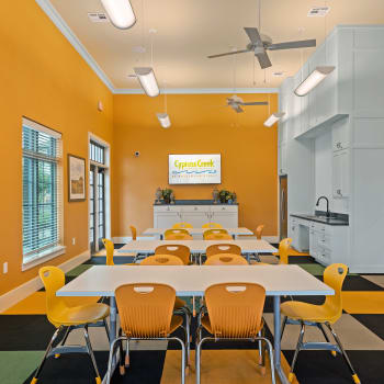 The community activity room at Cypress Creek at Hazelwood in Princeton, Texas