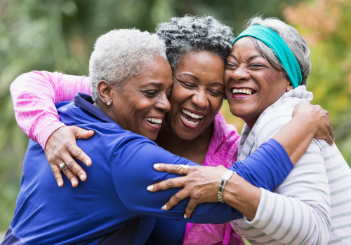 Resident friends hugging at Methodist Homes of Alabama & Northwest Florida. 