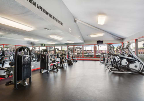 Huge modern fitness center at Emerald Pointe Apartment Homes in Harvey, Louisiana