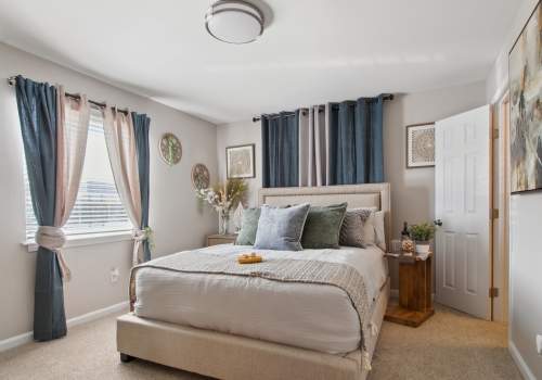 Spacious bedroom at Emerald Pointe Apartment Homes in Harvey, Louisiana