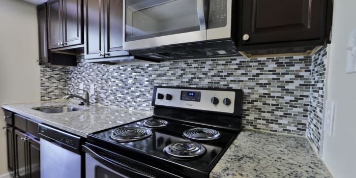 Villages at Montpelier Apartment Homes offers a kitchen in Laurel, MD