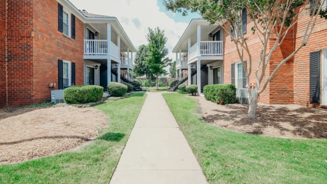 Exterior Walkway at Halcyon Park Apartments in Montgomery, Alabama