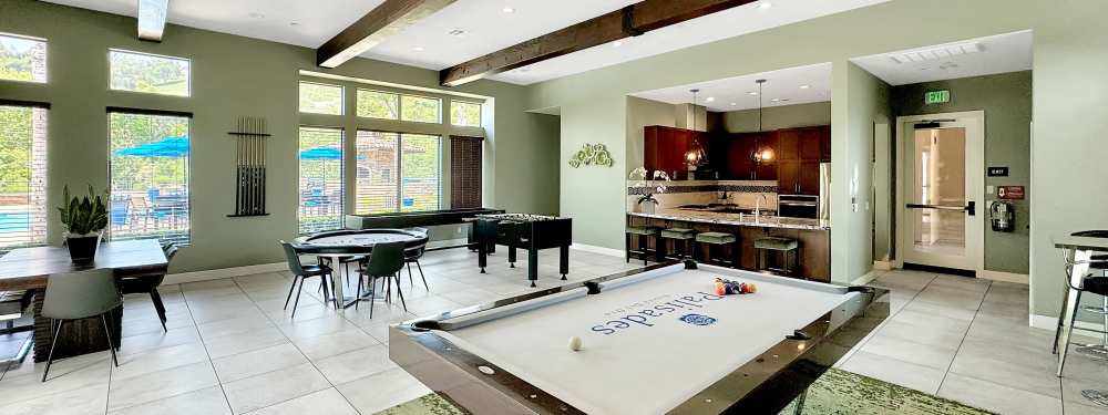 Billiards and plentiful seating in the resident lounge at Palisades Sierra Del Oro in Corona, California