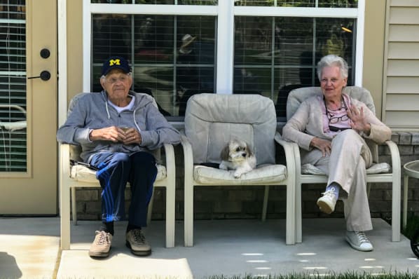 Residents Enjoying an Outdoor Performance From Their Apartment Home at All Seasons West Bloomfield in West Bloomfield, Michigan