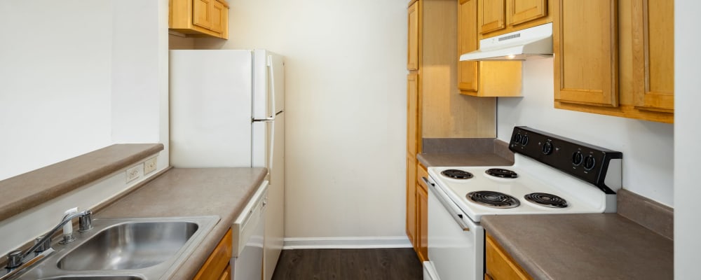 An apartment kitchen at The Oaks of St. Clair in Moody, Alabama