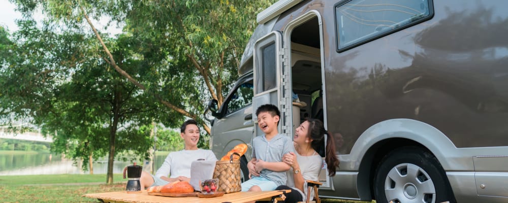 Family sitting outside of their cool rv near South Albany Self Storage in Tangent, Oregon