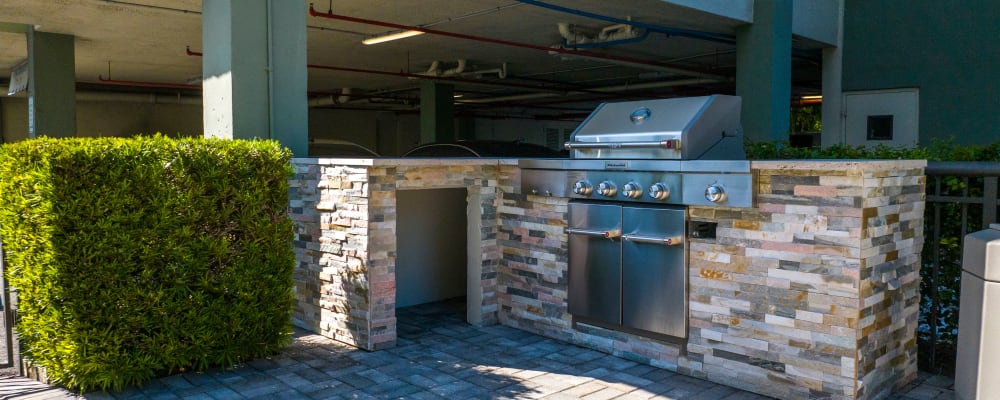 A grilling station near the pool at Forest Place in North Miami, Florida