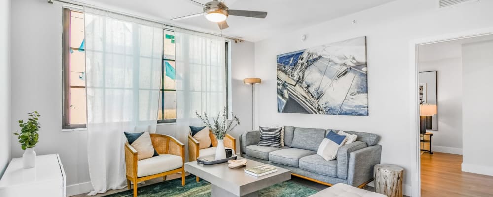 A furnished apartment living room at Marina Del Sol in Sunny Isles Beach, Florida