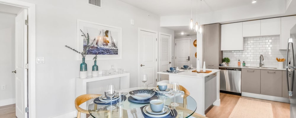 An apartment dining room and kitchen at Marina Del Viento in Sunny Isles Beach, Florida