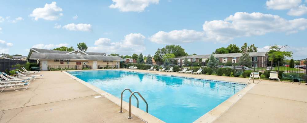 Swimming pool with laid back chairs at Park Ridge Commons in Des Plaines, Illinois