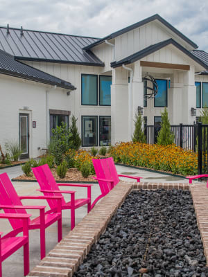 Firepit and adirondack chairs at Redbud Ranch Apartments in Broken Arrow, Oklahoma