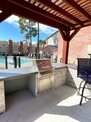 BBQ area at The Abbey at Montgomery Park in Conroe, Texas