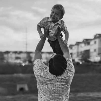 Man playing with his child at Cumberland on Church in Nashville, Tennessee