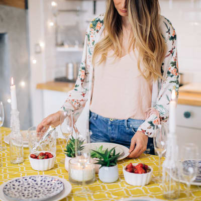 Resident preparing a fresh, delectable meal in her new home at Sofi Ventura in Ventura, California