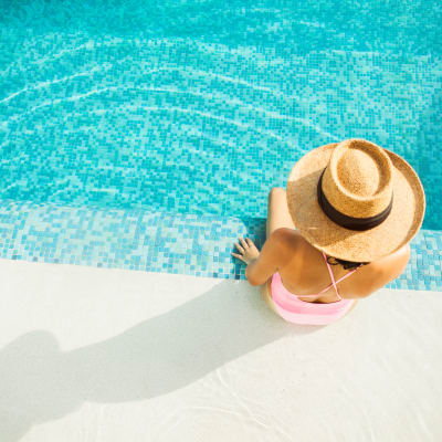 Women enjoying the swimming pool at Domus on the Boulevard in Mountain View, California