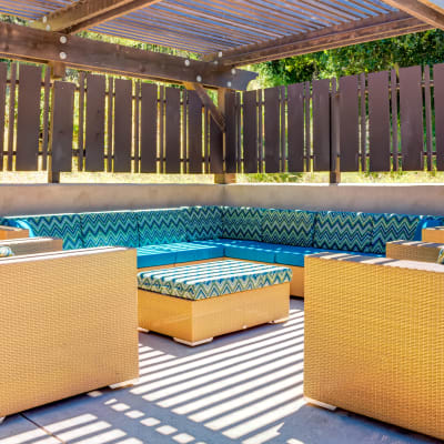 Outdoor lounge near the pool at Sofi Belmont Hills in Belmont, California