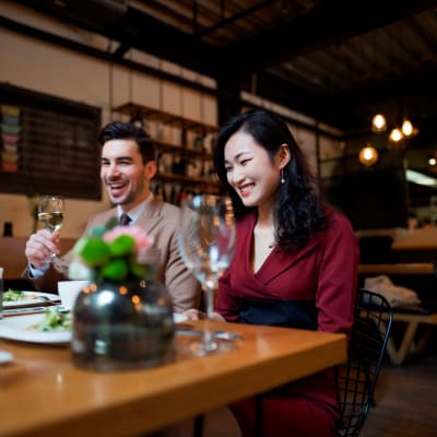 Resident couple out to dinner with their friends near London Terrace Gardens in New York, New York