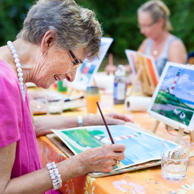 Resident taking an art class at Westminster Memory Care in Aiken, South Carolina