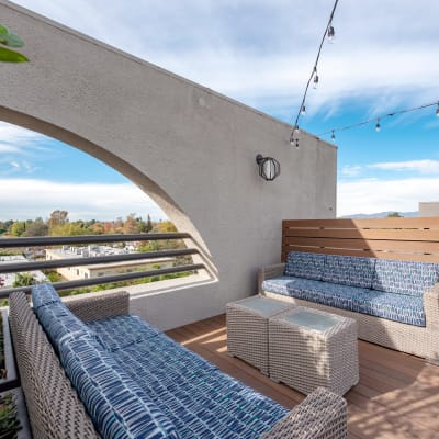 Modern couches on a balcony at Vue at Laurel Canyon in Valley Village, California