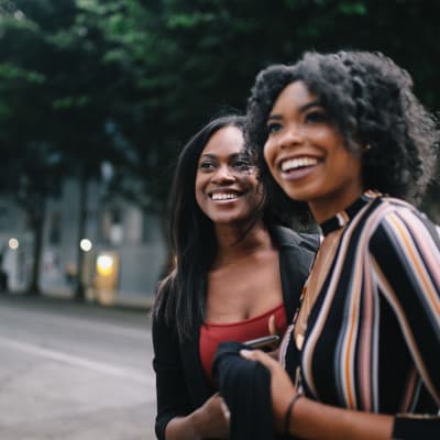 Friends exploring the neighborhood near Residences at 8 East Huron in Chicago, Illinois