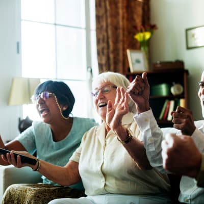 Group of residents cheering at Deephaven Woods in Deephaven, Minnesota