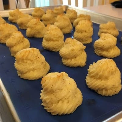 Twice baked Douchesse potatoes with nutmeg served at First & Main of Bloomfield Township in Bloomfield Township, Michigan