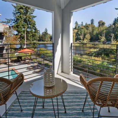 Outdoor lounge with a view of the late outside the upper floor of the resident clubhouse at Sofi Lakeside in Everett, Washington