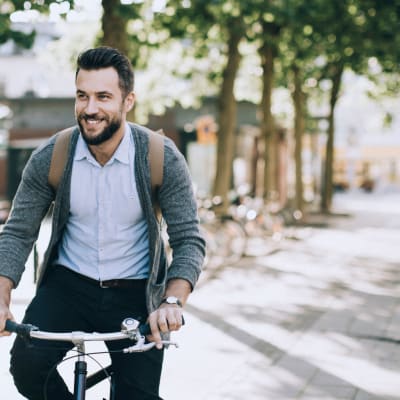 Resident riding his bike near Water Marq in Austin, Texas