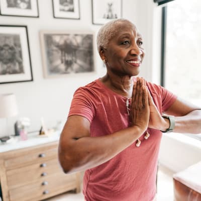 Woman doing yoga at RockBrook Memory Care in Lewisville, Texas